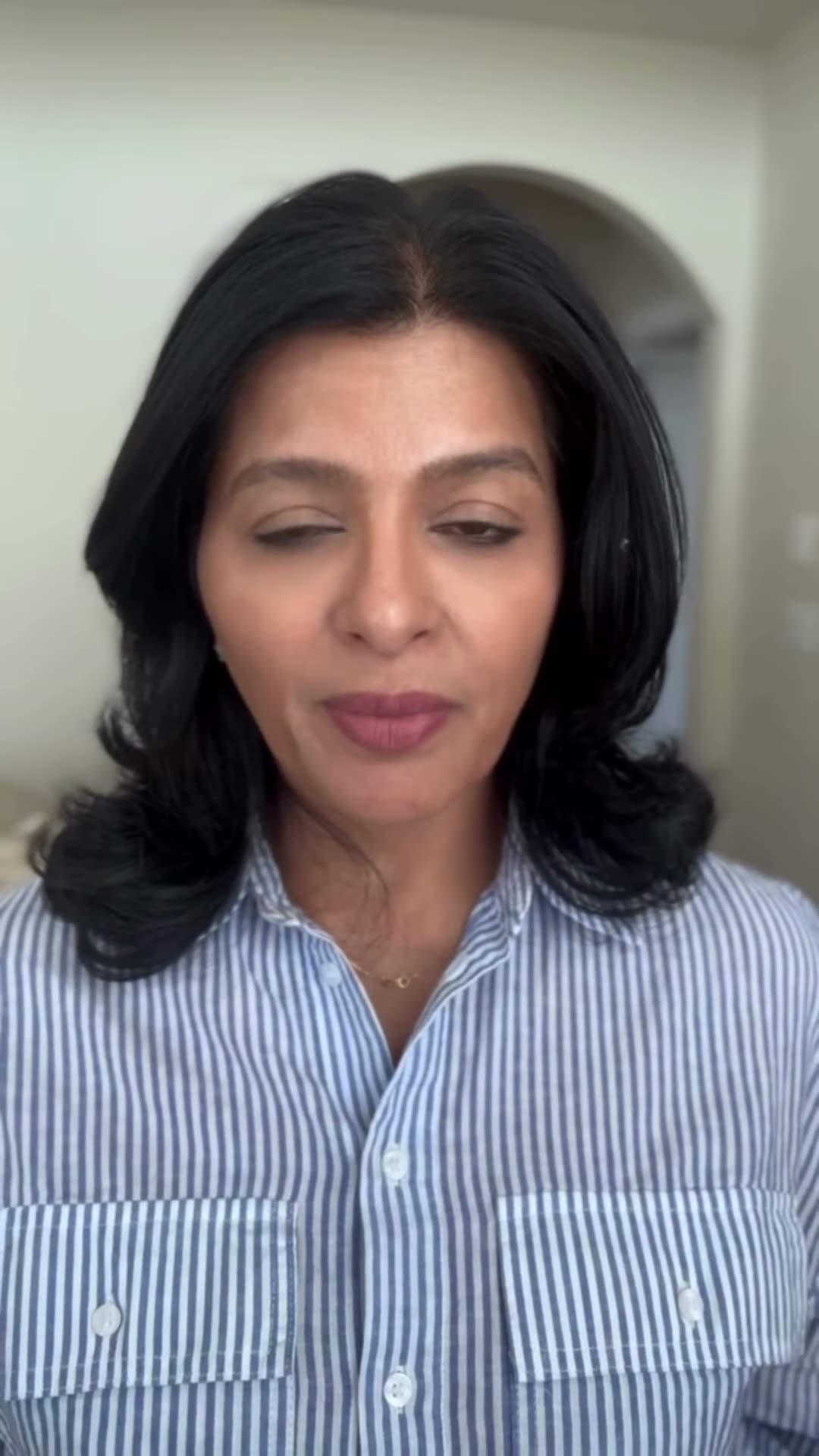 Priti Patel talking through a skincare question to camera at Le Petit Spa